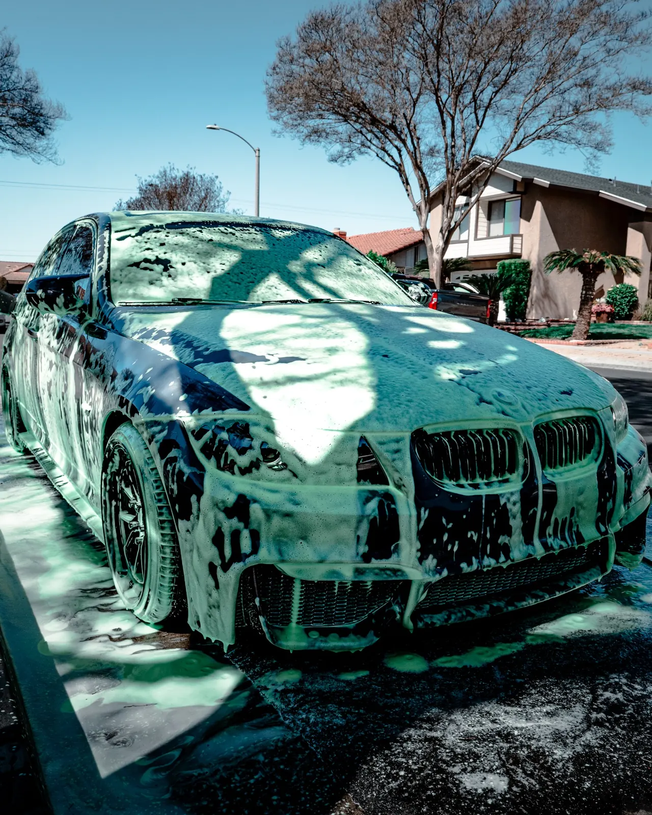 Sabino's Famous Auto Detailing applies premium foam wash to luxury vehicle in Las Vegas.